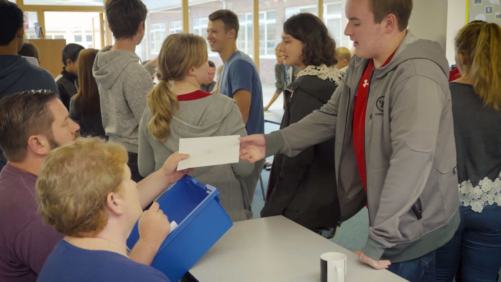 Filming a GCSE results day in a Welsh school