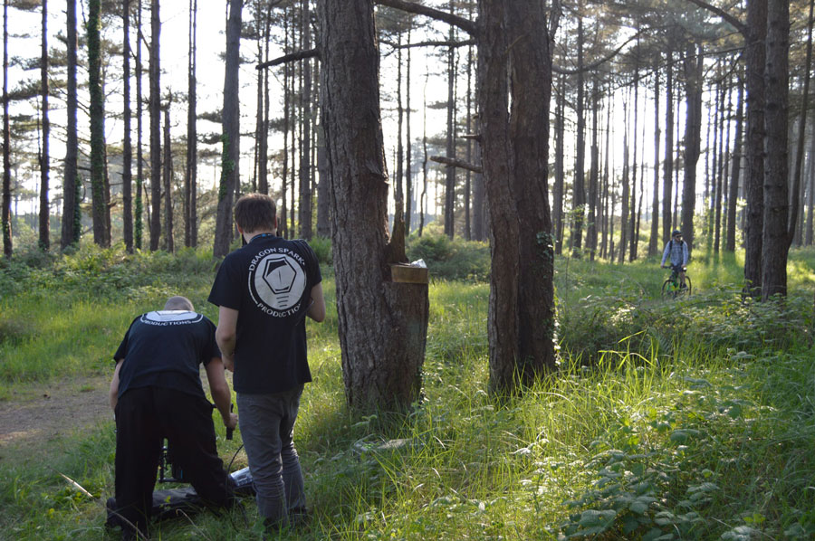 Filming a cyclist looking for a geocache in Pembrey