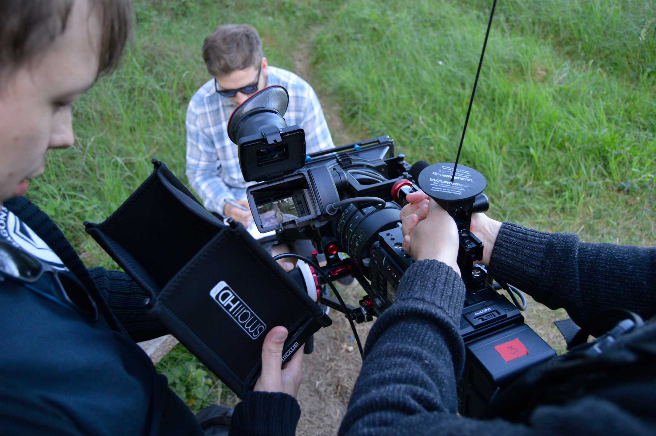 Filming an artist outdoors in Pembrey 