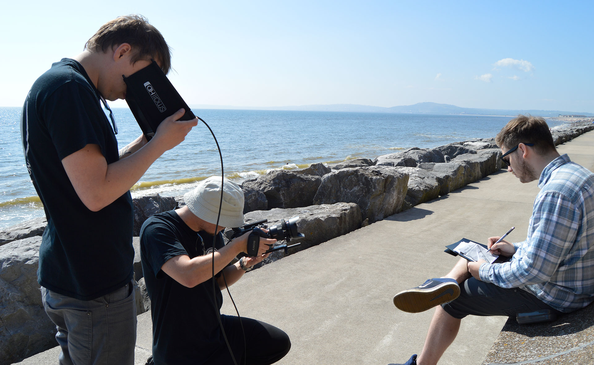 Filming a man drawing at Aberavon beach