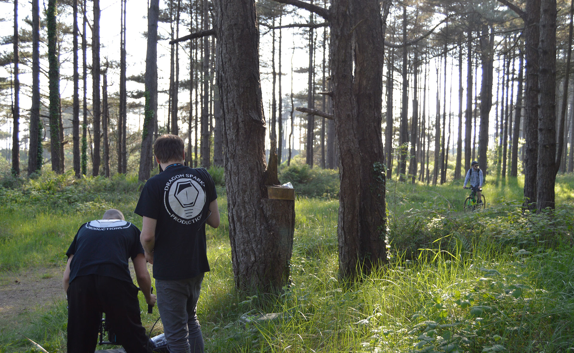 Filming a cyclist looking for a geocache in Pembrey