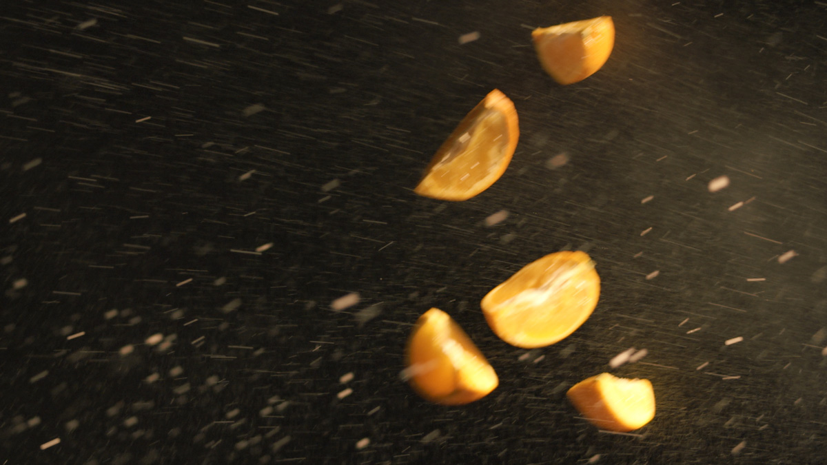 Sliced oranges in the air
