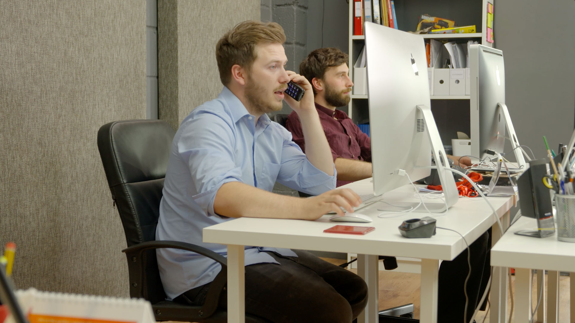Office worker on phone at desk