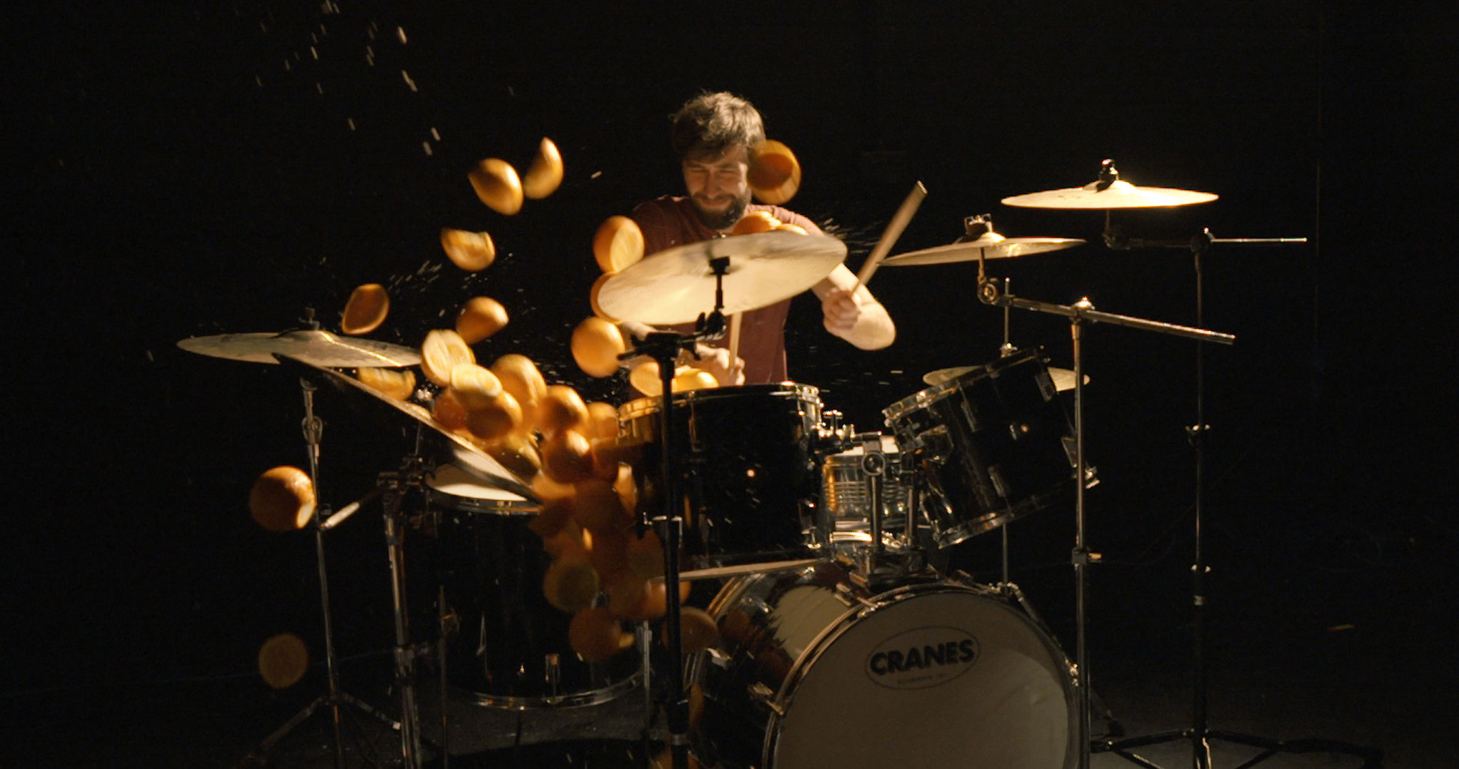 Drummer and drumkit with oranges