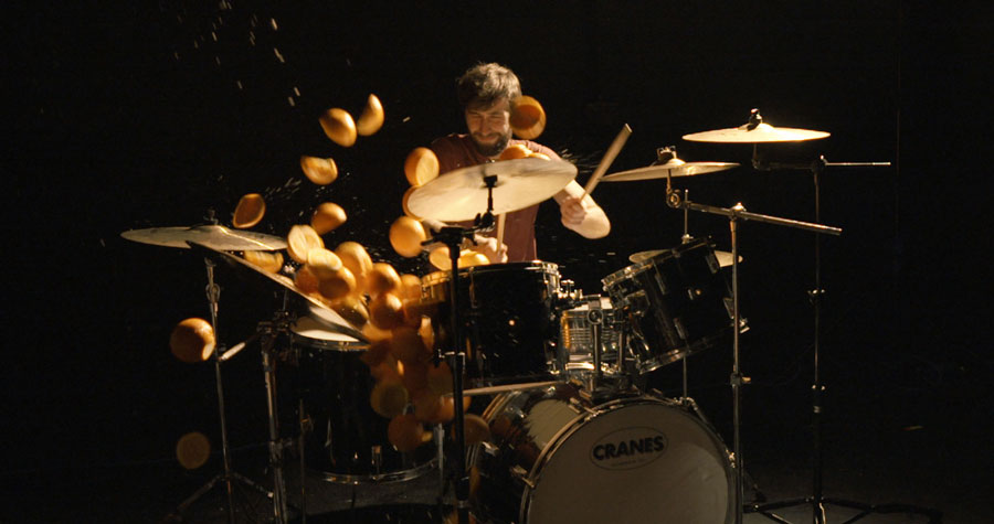 Drummer and drumkit with oranges
