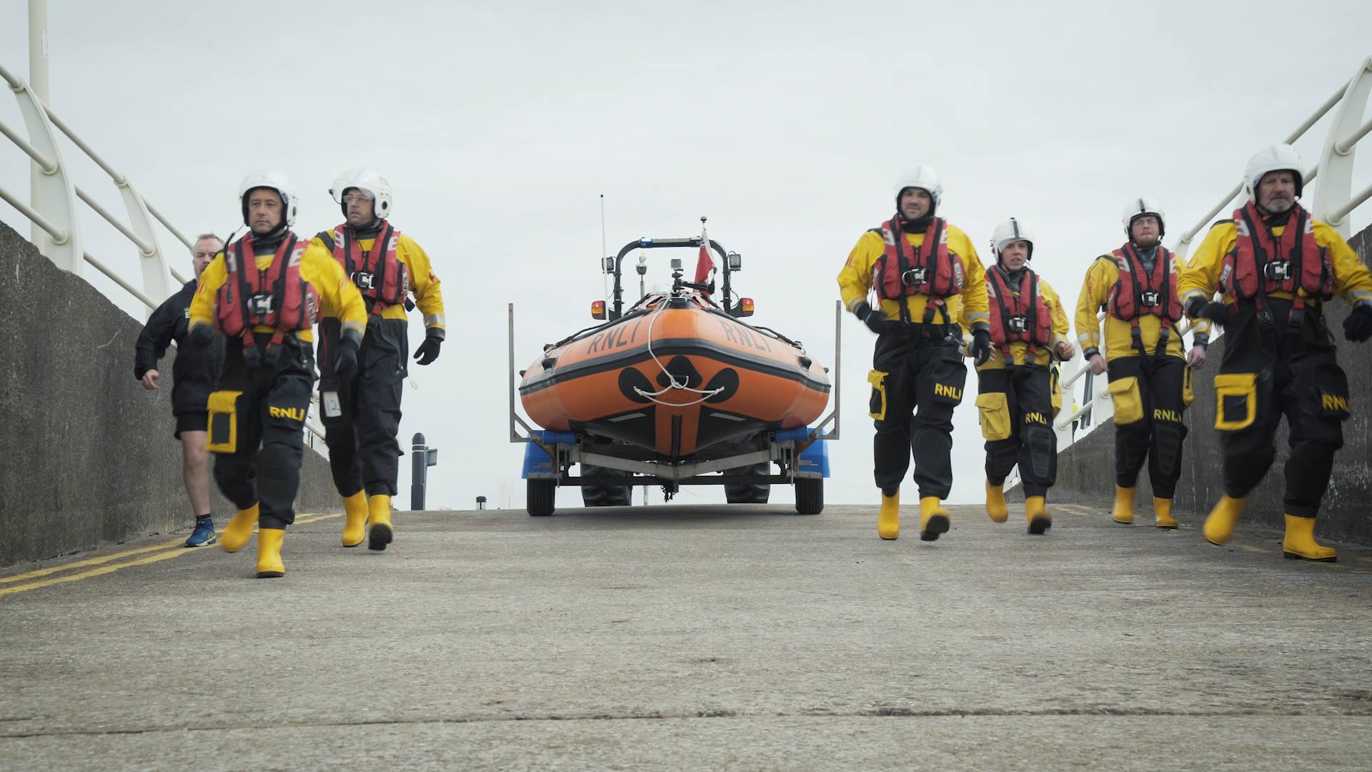 Boy pretending to be aeroplane at Wales Airshow