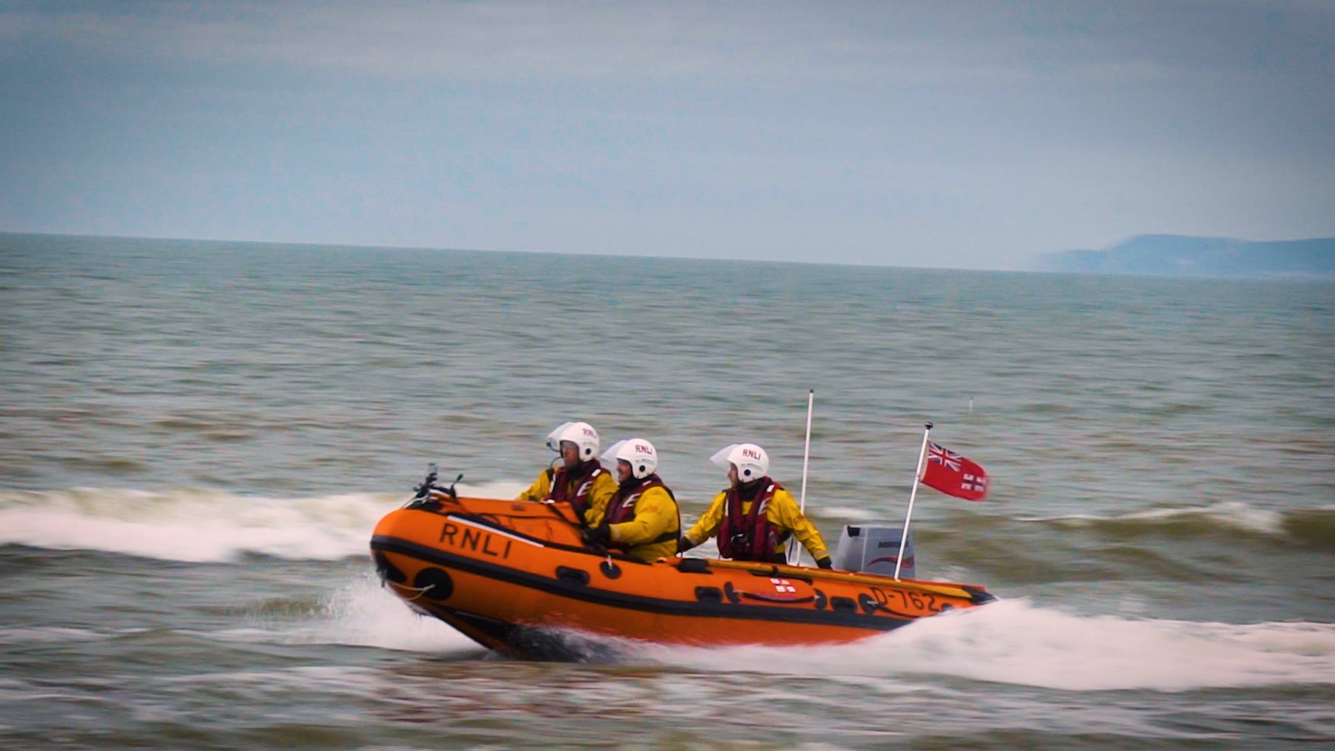 Boy pretending to be aeroplane at Wales Airshow