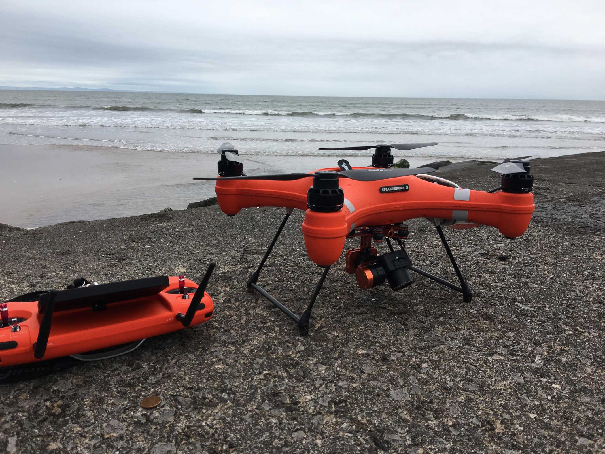 Boy pretending to be aeroplane at Wales Airshow