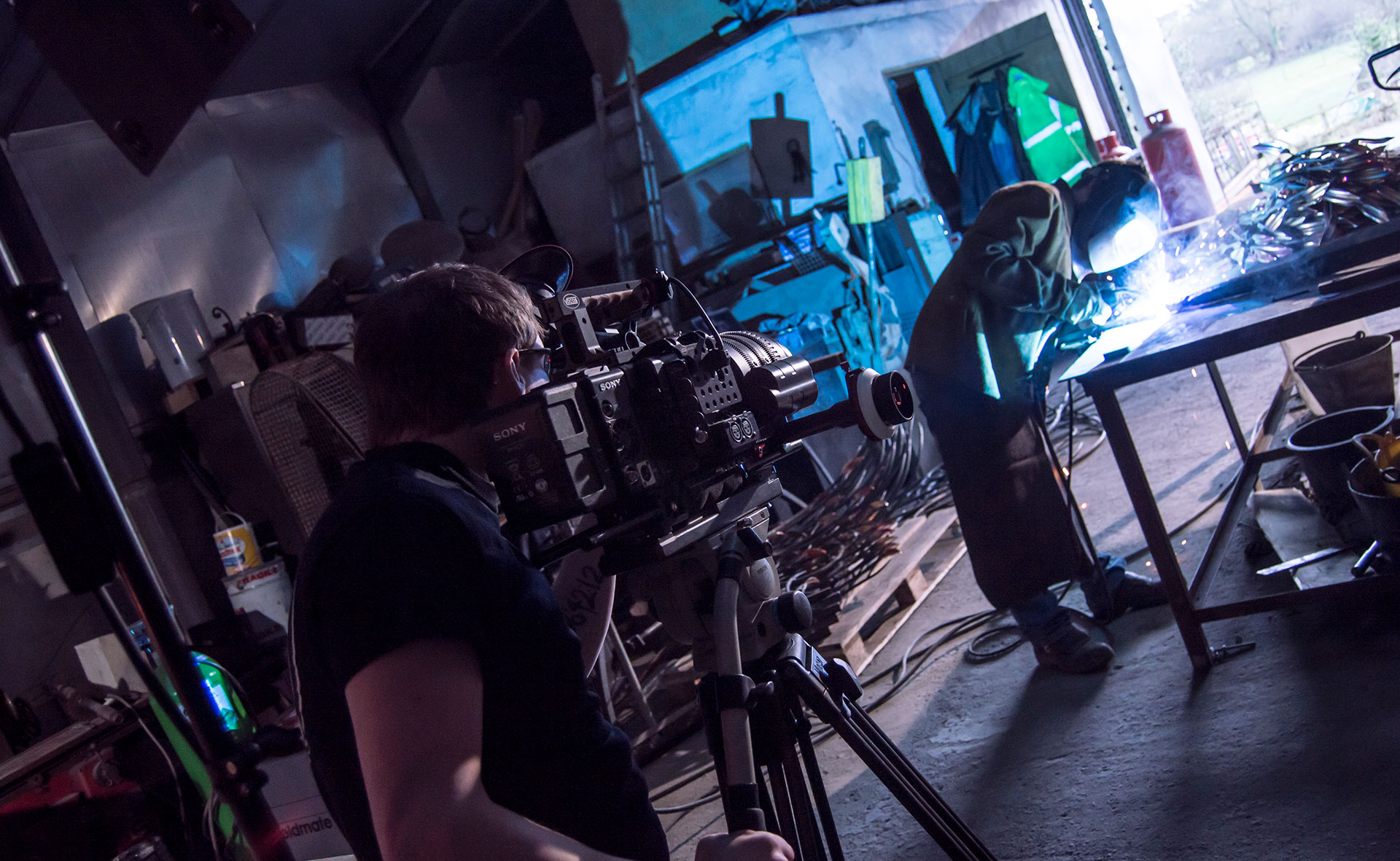 Filming welder in a forge