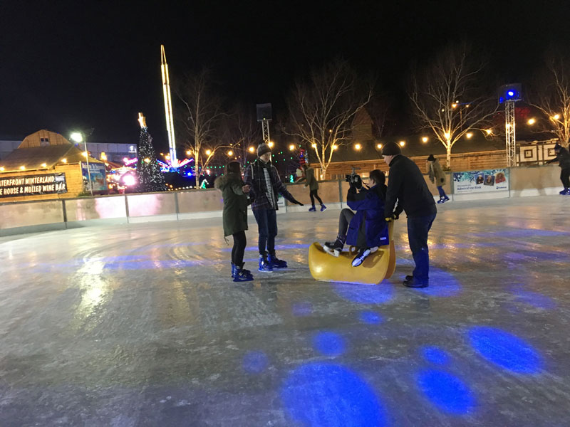 Filming ice skating on a rink